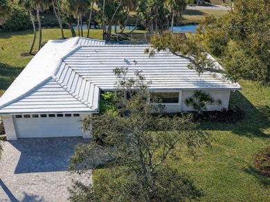 This exceptional lakefront gem is a nearly 2,000-square-foot on Gulf Gate Golf Club in Florida - for sale on GolfHomes.com, golf home, golf lot
