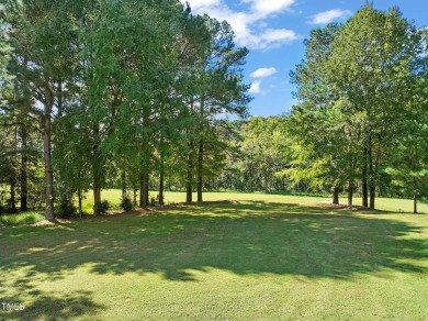 This stunning 2004 Custom Built French Country Wakefield Parade on TPC at Wakefield Plantation in North Carolina - for sale on GolfHomes.com, golf home, golf lot