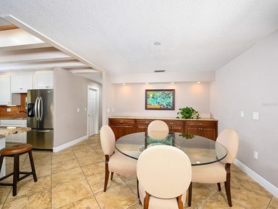 This exceptional lakefront gem is a nearly 2,000-square-foot on Gulf Gate Golf Club in Florida - for sale on GolfHomes.com, golf home, golf lot