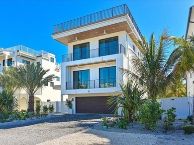 Experience elevated island living in this exceptional brand-new on Key Royale Club in Florida - for sale on GolfHomes.com, golf home, golf lot