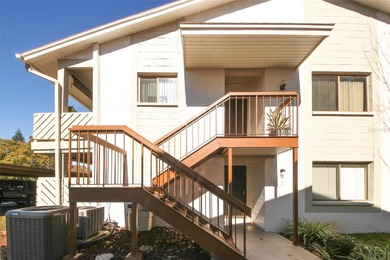 Immaculate second floor end unit in the beautiful Eagleswood on Beacon Woods Golf Club in Florida - for sale on GolfHomes.com, golf home, golf lot