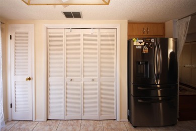 Immaculate second floor end unit in the beautiful Eagleswood on Beacon Woods Golf Club in Florida - for sale on GolfHomes.com, golf home, golf lot