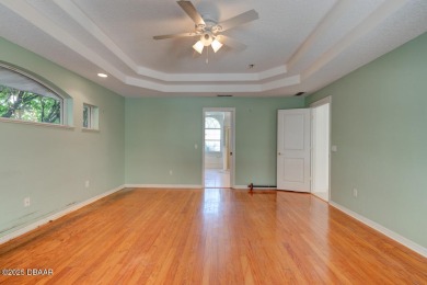 Spacious 3-bedroom, 2-bath home with a den located on the 7th on The Grand Club Cypress Course in Florida - for sale on GolfHomes.com, golf home, golf lot