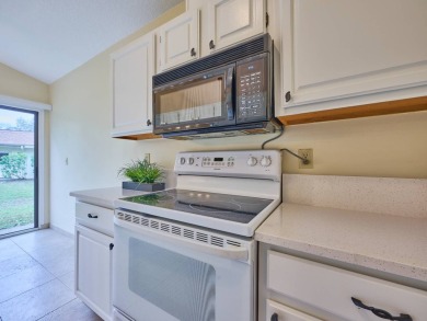 Experience the charm of mature live oak trees, classic terra on Suntree Country Club in Florida - for sale on GolfHomes.com, golf home, golf lot