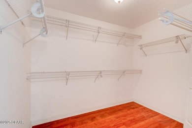 Spacious 3-bedroom, 2-bath home with a den located on the 7th on The Grand Club Cypress Course in Florida - for sale on GolfHomes.com, golf home, golf lot