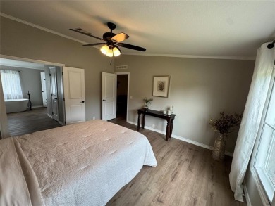 This is a newly remodeled mobile home in Horseshoe Bend Air Park on Horseshoe Bend Country Club in Texas - for sale on GolfHomes.com, golf home, golf lot