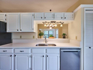 Experience the charm of mature live oak trees, classic terra on Suntree Country Club in Florida - for sale on GolfHomes.com, golf home, golf lot