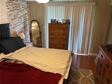 Move-in ready home in a desirable 55+ golf community overlooking on Zellwood Station Country Club in Florida - for sale on GolfHomes.com, golf home, golf lot