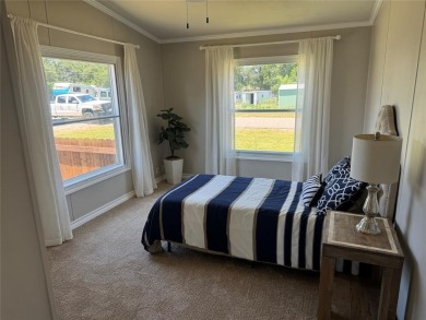 This is a newly remodeled mobile home in Horseshoe Bend Air Park on Horseshoe Bend Country Club in Texas - for sale on GolfHomes.com, golf home, golf lot