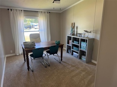 This is a newly remodeled mobile home in Horseshoe Bend Air Park on Horseshoe Bend Country Club in Texas - for sale on GolfHomes.com, golf home, golf lot