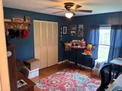 Move-in ready home in a desirable 55+ golf community overlooking on Zellwood Station Country Club in Florida - for sale on GolfHomes.com, golf home, golf lot