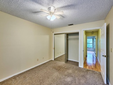 Experience the charm of mature live oak trees, classic terra on Suntree Country Club in Florida - for sale on GolfHomes.com, golf home, golf lot