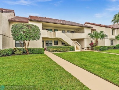 Serene 2nd Floor, Lakefront 2/2 w/vaulted ceilings & a split on The Links At Boynton Beach - The Family Course in Florida - for sale on GolfHomes.com, golf home, golf lot