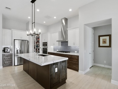 This stunning Mandera model offers a rare opportunity to own an on Tuscany Falls At Pebble Creek in Arizona - for sale on GolfHomes.com, golf home, golf lot