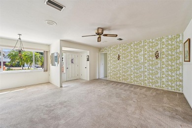 Perfectly positioned in highly desirable Venice East, this on Venice East Golf Club in Florida - for sale on GolfHomes.com, golf home, golf lot