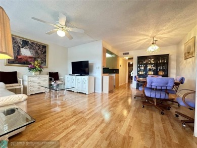 Welcome home to this RARE 1 bdrm, 2 full bath condo on the FIRST on Hillsboro Pines Golf in Florida - for sale on GolfHomes.com, golf home, golf lot