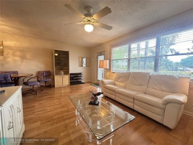 Welcome home to this RARE 1 bdrm, 2 full bath condo on the FIRST on Hillsboro Pines Golf in Florida - for sale on GolfHomes.com, golf home, golf lot