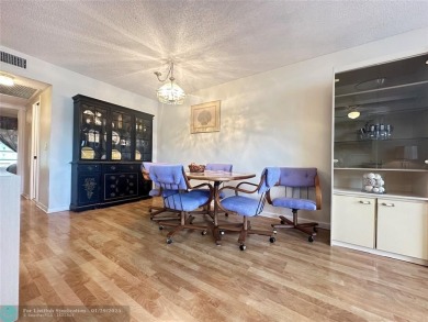 Welcome home to this RARE 1 bdrm, 2 full bath condo on the FIRST on Hillsboro Pines Golf in Florida - for sale on GolfHomes.com, golf home, golf lot