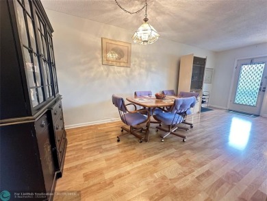 Welcome home to this RARE 1 bdrm, 2 full bath condo on the FIRST on Hillsboro Pines Golf in Florida - for sale on GolfHomes.com, golf home, golf lot