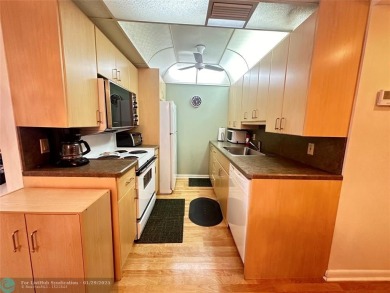 Welcome home to this RARE 1 bdrm, 2 full bath condo on the FIRST on Hillsboro Pines Golf in Florida - for sale on GolfHomes.com, golf home, golf lot