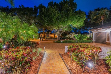 Experience refined Florida living in this exquisitely maintained on Fox Hollow Golf Club in Florida - for sale on GolfHomes.com, golf home, golf lot