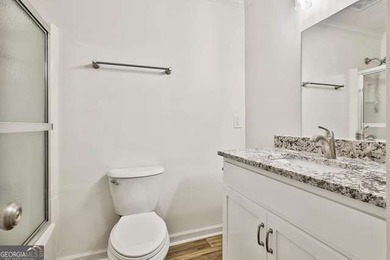 Completely renovated and truly move-in ready, this charming home on Canongate On White Oak Golf Course in Georgia - for sale on GolfHomes.com, golf home, golf lot