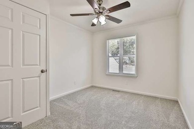 Completely renovated and truly move-in ready, this charming home on Canongate On White Oak Golf Course in Georgia - for sale on GolfHomes.com, golf home, golf lot