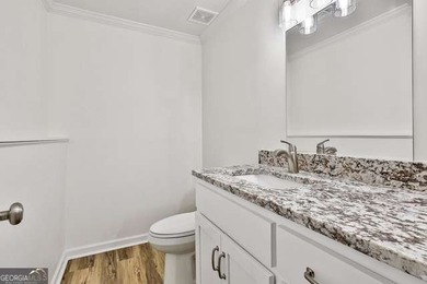 Completely renovated and truly move-in ready, this charming home on Canongate On White Oak Golf Course in Georgia - for sale on GolfHomes.com, golf home, golf lot