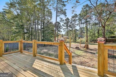 Completely renovated and truly move-in ready, this charming home on Canongate On White Oak Golf Course in Georgia - for sale on GolfHomes.com, golf home, golf lot
