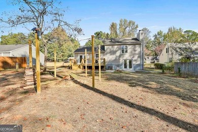 Golf course living with major upgrades! Located on the 17th hole on Canongate On White Oak Golf Course in Georgia - for sale on GolfHomes.com, golf home, golf lot