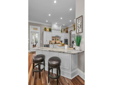Experience refined Florida living in this exquisitely maintained on Fox Hollow Golf Club in Florida - for sale on GolfHomes.com, golf home, golf lot