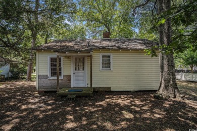 This charming 2-bedroom, 1-bath cottage with no HOA is located on Beachwood Golf Club in South Carolina - for sale on GolfHomes.com, golf home, golf lot