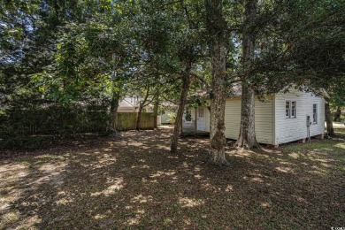 This charming 2-bedroom, 1-bath cottage with no HOA is located on Beachwood Golf Club in South Carolina - for sale on GolfHomes.com, golf home, golf lot