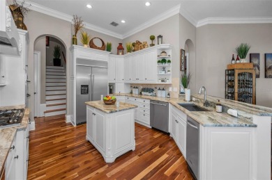 Experience refined Florida living in this exquisitely maintained on Fox Hollow Golf Club in Florida - for sale on GolfHomes.com, golf home, golf lot