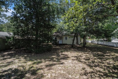 This charming 2-bedroom, 1-bath cottage with no HOA is located on Beachwood Golf Club in South Carolina - for sale on GolfHomes.com, golf home, golf lot