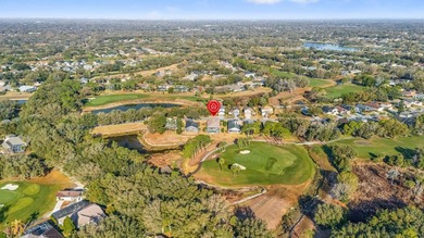 Located within the prestigious, gated community of River Hills on River Hills Country Club in Florida - for sale on GolfHomes.com, golf home, golf lot