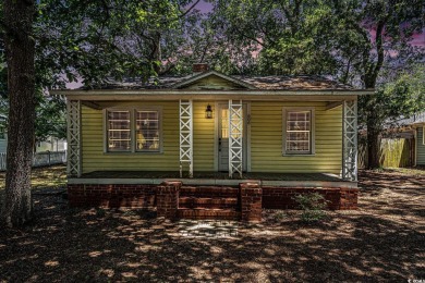 This charming 2-bedroom, 1-bath cottage with no HOA is located on Beachwood Golf Club in South Carolina - for sale on GolfHomes.com, golf home, golf lot