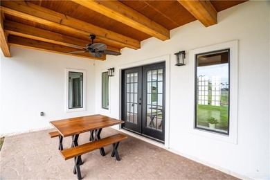 Stunning 2024 custom-built home sits on a desirable corner lot on Los Lagos Golf Club in Texas - for sale on GolfHomes.com, golf home, golf lot