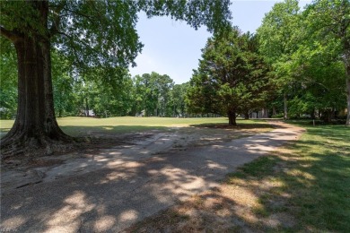 Situated on a beautiful cul-de-sac lot on the 11th green of the on Kingsmill Resort and Golf Club in Virginia - for sale on GolfHomes.com, golf home, golf lot