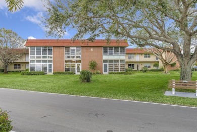 Coveted 1st-floor complete with full remodel! Impact glass on The American Golf Club in Florida - for sale on GolfHomes.com, golf home, golf lot