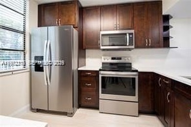 Wake up every morning to peaceful golf course views in one of on Pine Island Ridge Country Club in Florida - for sale on GolfHomes.com, golf home, golf lot