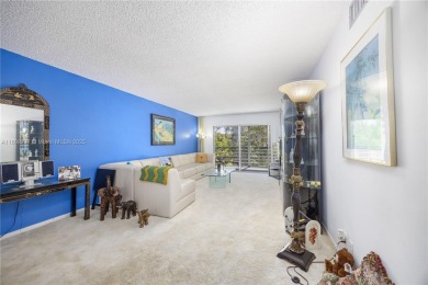 Motivated Seller!  Beautifully updated 2-bed, 2-bath corner unit on Wynmoor Golf Course in Florida - for sale on GolfHomes.com, golf home, golf lot