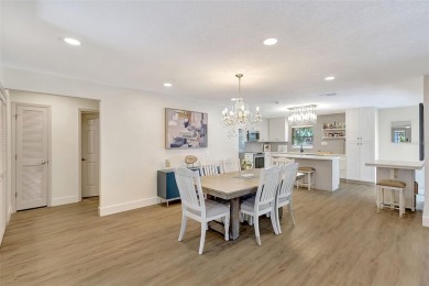 This beautifully maintained 3-bedroom, 2-bath pool home is on Palm Aire Country Club of Sarasota in Florida - for sale on GolfHomes.com, golf home, golf lot