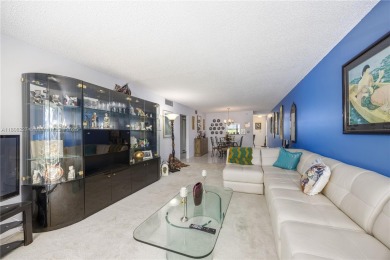 Motivated Seller!  Beautifully updated 2-bed, 2-bath corner unit on Wynmoor Golf Course in Florida - for sale on GolfHomes.com, golf home, golf lot