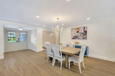 This beautifully maintained 3-bedroom, 2-bath pool home is on Palm Aire Country Club of Sarasota in Florida - for sale on GolfHomes.com, golf home, golf lot
