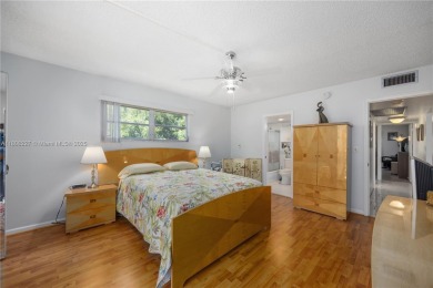 Motivated Seller!  Beautifully updated 2-bed, 2-bath corner unit on Wynmoor Golf Course in Florida - for sale on GolfHomes.com, golf home, golf lot