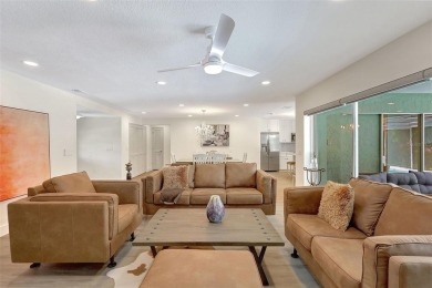 This beautifully maintained 3-bedroom, 2-bath pool home is on Palm Aire Country Club of Sarasota in Florida - for sale on GolfHomes.com, golf home, golf lot