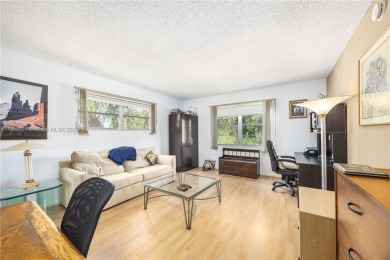 Motivated Seller!  Beautifully updated 2-bed, 2-bath corner unit on Wynmoor Golf Course in Florida - for sale on GolfHomes.com, golf home, golf lot