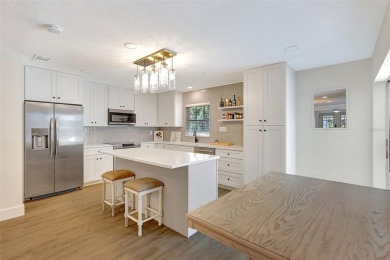 This beautifully maintained 3-bedroom, 2-bath pool home is on Palm Aire Country Club of Sarasota in Florida - for sale on GolfHomes.com, golf home, golf lot