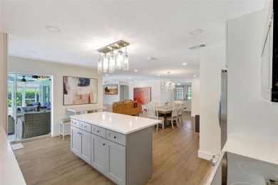 This beautifully maintained 3-bedroom, 2-bath pool home is on Palm Aire Country Club of Sarasota in Florida - for sale on GolfHomes.com, golf home, golf lot